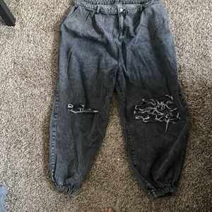Acid washed ripped jean joggers